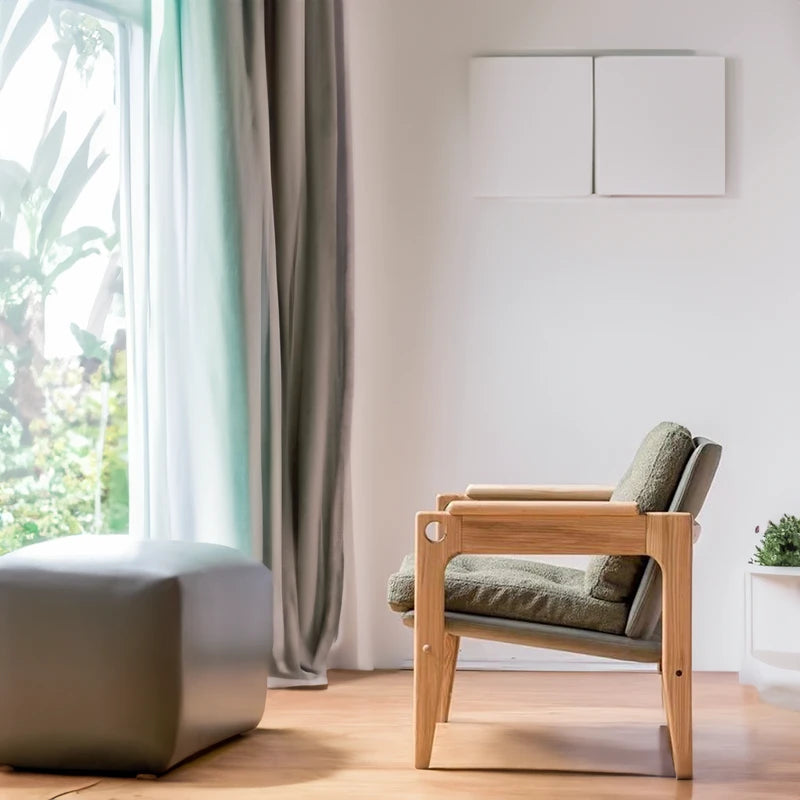 Green fabric accent chair: A handsome and dapper must-have living room piece