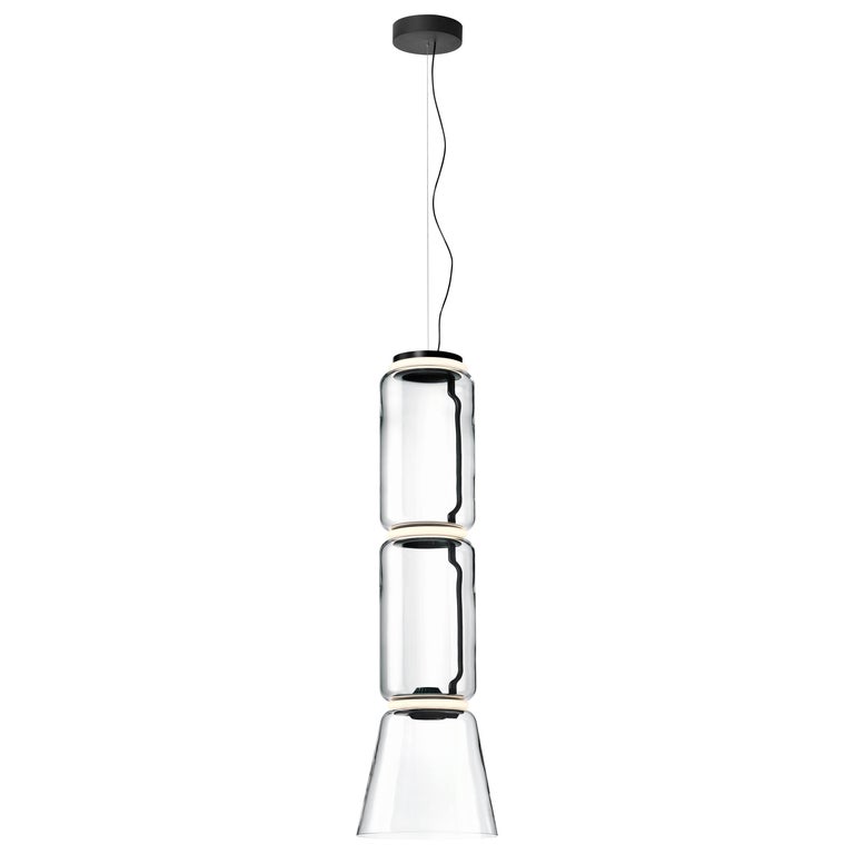 The key to his design of the extraordinary Noctambule Style Pendant Light was, â€œtransparency and the idea of glass.